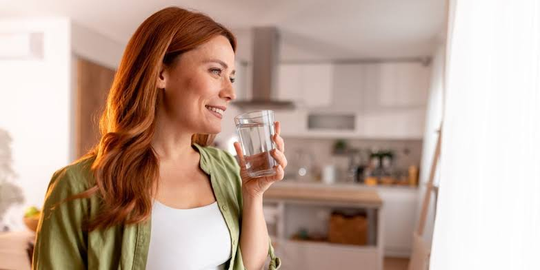 Wellness Guide 2026 featuring easy self-care and healthy lifestyle tips for better sleep, healthy eating, daily movement, hydration, mental well-being, skincare, and balanced everyday living.